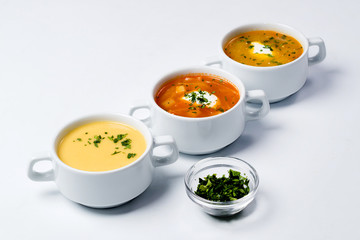 Different soups in plates