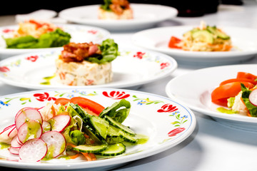 Different spring salads in plates