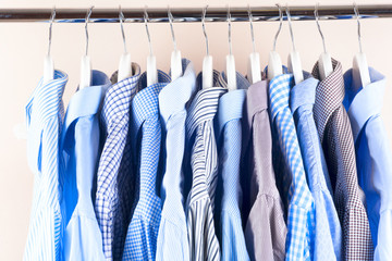 Cloth Hangers with Shirts. Men's clothes