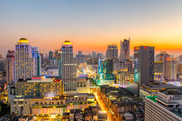 Fototapeta na wymiar Bangkok City skyline aerial view at night time and skyscrapers of midtown bangkok.