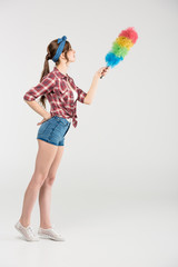 Young woman with duster