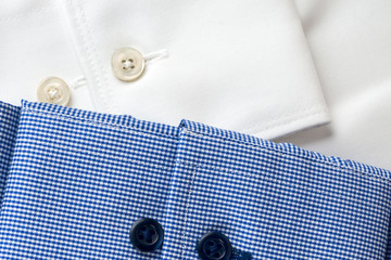 Stack of blue and white shirt closeup
