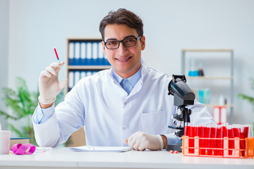 Doctor working with blood samples