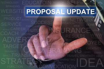 Businessman touching PROPOSAL UPDATE button on virtual screen