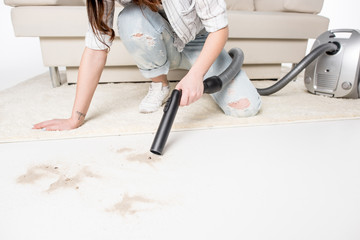 Woman with vacuum cleaner