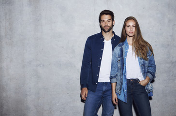 Good looking duo in double denim, portrait