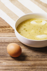 Fresh polish soup on a wooden table