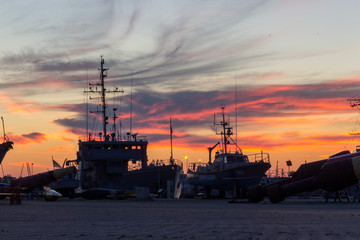 Fototapeta premium Silhouettes of ships at berth