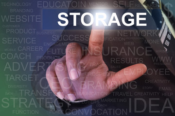 Businessman touching storage button on virtual screen