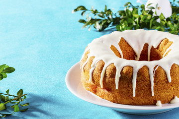 Easter cake on a turquoise tablecloth