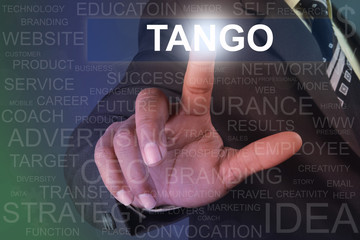 Businessman touching tango button on virtual screen