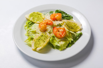 Caesar Salad with Seafood and Croutons Dressed with Parmesan Cheese