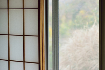 Background texture of Japanese wooden window frame with washi paper