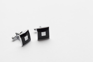 cufflinks on white background
