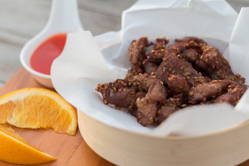 Deep fried pork that serve with ketchup