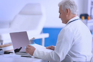 Male doctor at work in clinic