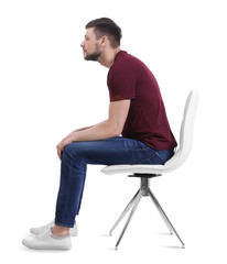 Posture concept. Man sitting on chair against white background