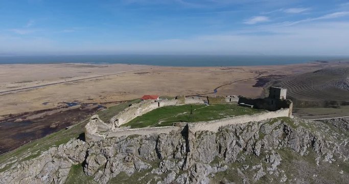 Enisala medieval fortress in Dobrogea, Romania (Tulcea County). Aerial view from a drone