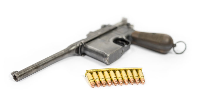 Pistol Mauser with ammo isolated on white background