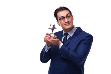 Businessman with star award isolated on white