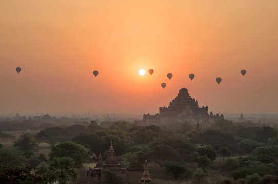 Hot air balloons at sunrise at Bagan temple in Burma, Myanmar