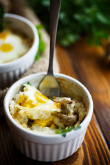 Baked egg with minced fish and mushrooms