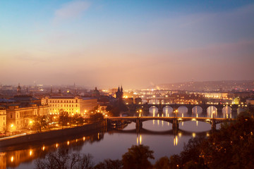 Fototapeta na wymiar Morning view from above on Prague bridges, Charles Bridge on first plan.
