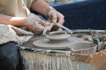 Measuring a Clay Pot on a Traditional Potters Wheel.