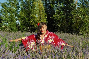 girl in yukata smiling in a lavender field 