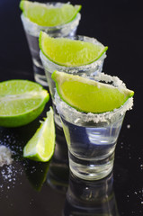 Fototapeta na wymiar Silver tequila with lime and salt