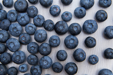 Blueberry on wooden background. Top view