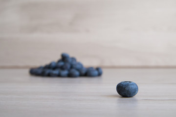 Blueberry on wooden background