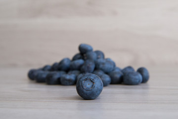 Blueberry on wooden background