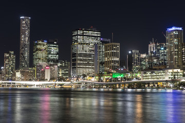 Brisbane City night cityscape and Victoria bridge over the Brisbane River.