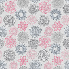 Seamless pattern with hand drawn doodle ornate flowers.