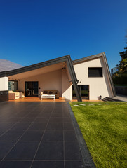 Modern villa, exterior with lawn, nobody