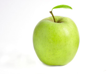 Green apple with leaf isolated on a white background