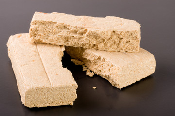 peanut halva on a dark background closeup
