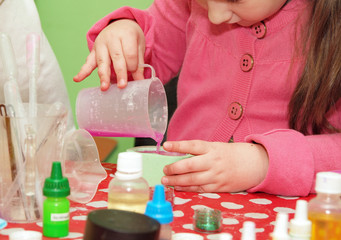 Homemade soap preparation. filling up of forms. children`s art