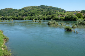 Fototapeta na wymiar River Una on a summer day in Hrvatska Kostajnica, Croatia