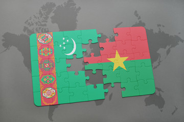 puzzle with the national flag of turkmenistan and burkina faso on a world map