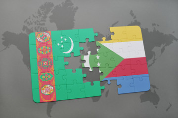 puzzle with the national flag of turkmenistan and comoros on a world map