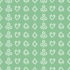 Seamless vector pattern with icons of playings cards. Green background with hand drawn symbols. Decorative repeat ornament. Series of Gaming and Gambling Seamless vector Patterns.