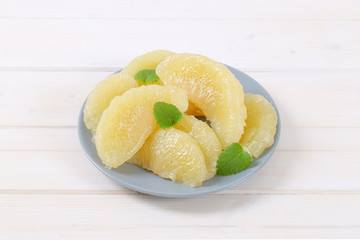 peeled pomelo segments