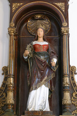 Obraz premium Saint Catherine of Alexandria statue on the altar in Parish Church of Our Lady of Snow in Dubranec, Croatia on November 17, 2010.