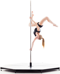 Woman doing pole dance, isolated on white