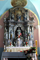 Fototapeta na wymiar Main altar in Parish Church of Saint Martin in Pisarovinska Jamnica, Croatia.