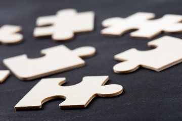Business solution concept jigsaw on the blackboard