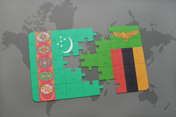 puzzle with the national flag of turkmenistan and zambia on a world map