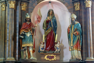 Saint Joseph holding baby Jesus statue at the altar in the Parish Church of Saint Joseph in Sisljavic, Croatia on August 23, 2011.